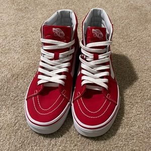 High top red vans. Never worn.